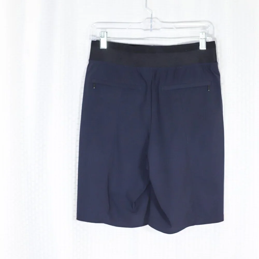 Athleta Size 8 dark blue Cosmic Bermuda stretch zip pockets shorts no size tag